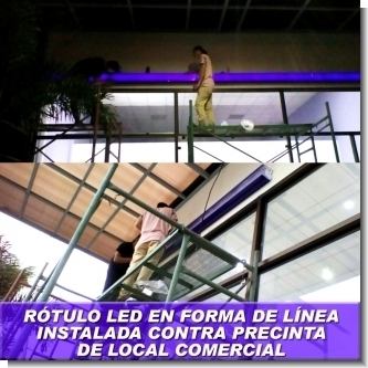 Linea LED Acrilica instalada contra precinta de local comercial